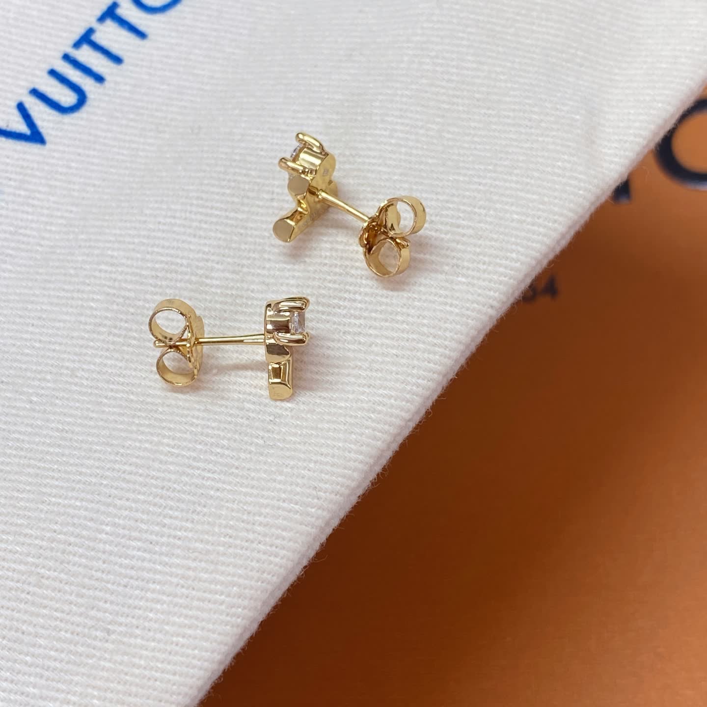 Louis Vuitton Gold Tone Stud Earrings with Clear Stones